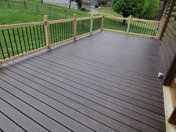 Composite deck with metal balusters