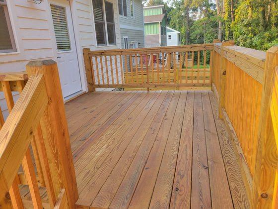 Pressure treated wood deck on a new build