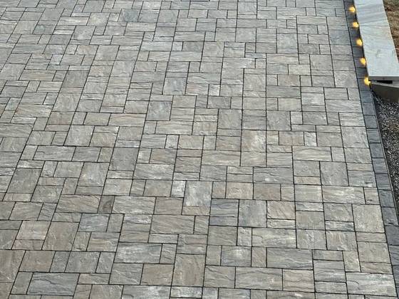 Paver patio with lit railing edge
